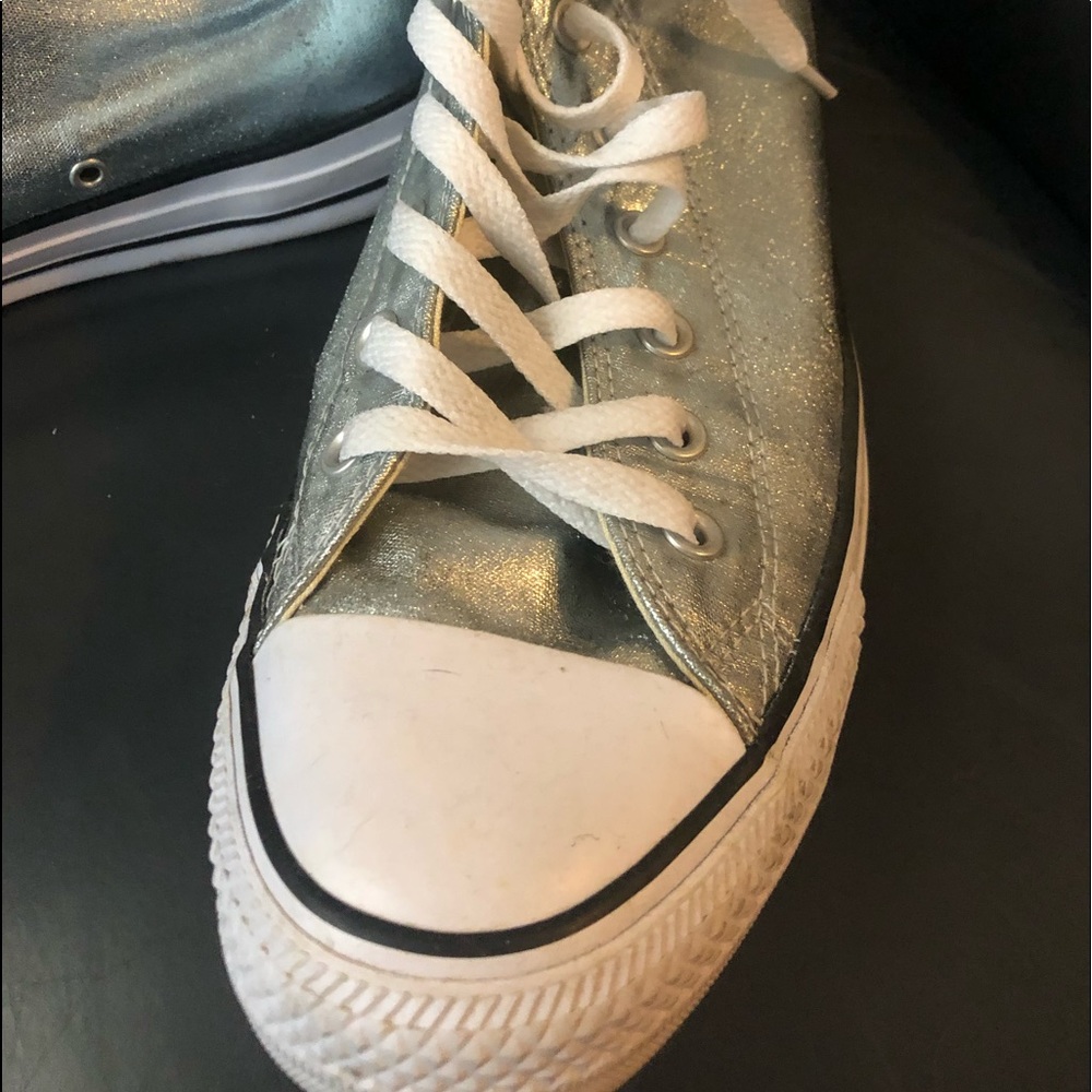 Beautiful size 11 high top chucks. Wore them once. Shiny rare style.